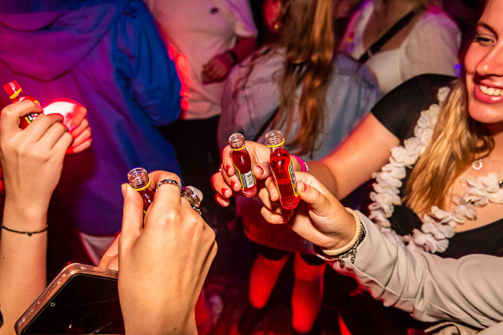 Image of people having fun at a party at a club-